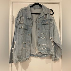 Vintage denim jacket purchased from a vintage pop up shop at Outside Lands in SF